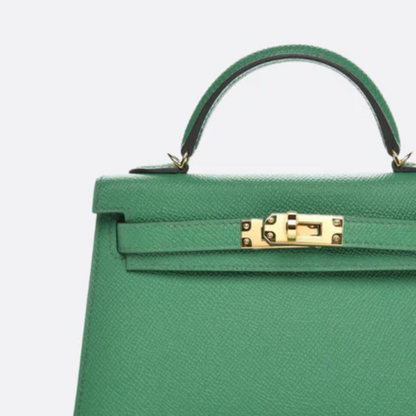 Tasche 20 Kly mit Goldbeschlägen in Grün