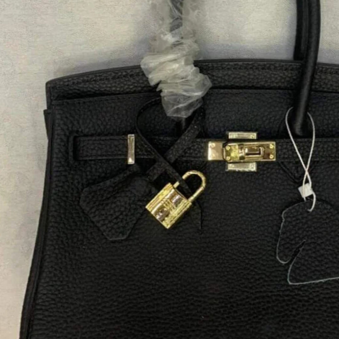 Tasche 25 Brk mit Goldbeschlägen in Schwarz