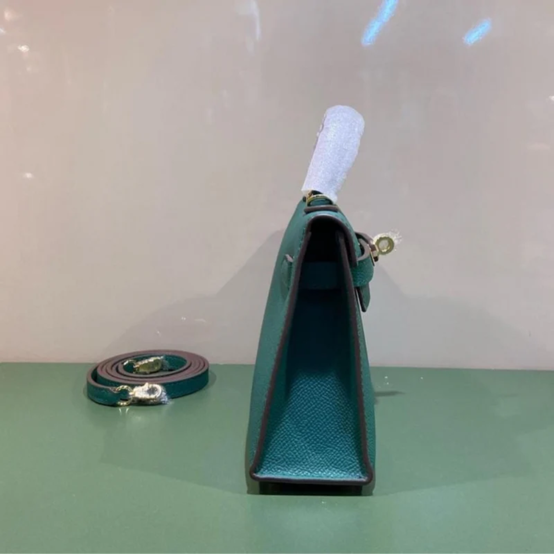 Tasche 20 Kly mit Goldbeschlägen in Grün