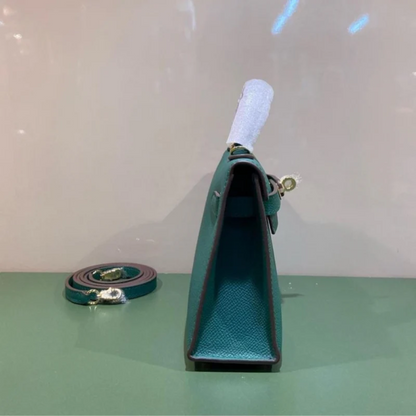 Tasche 20 Kly mit Goldbeschlägen in Grün