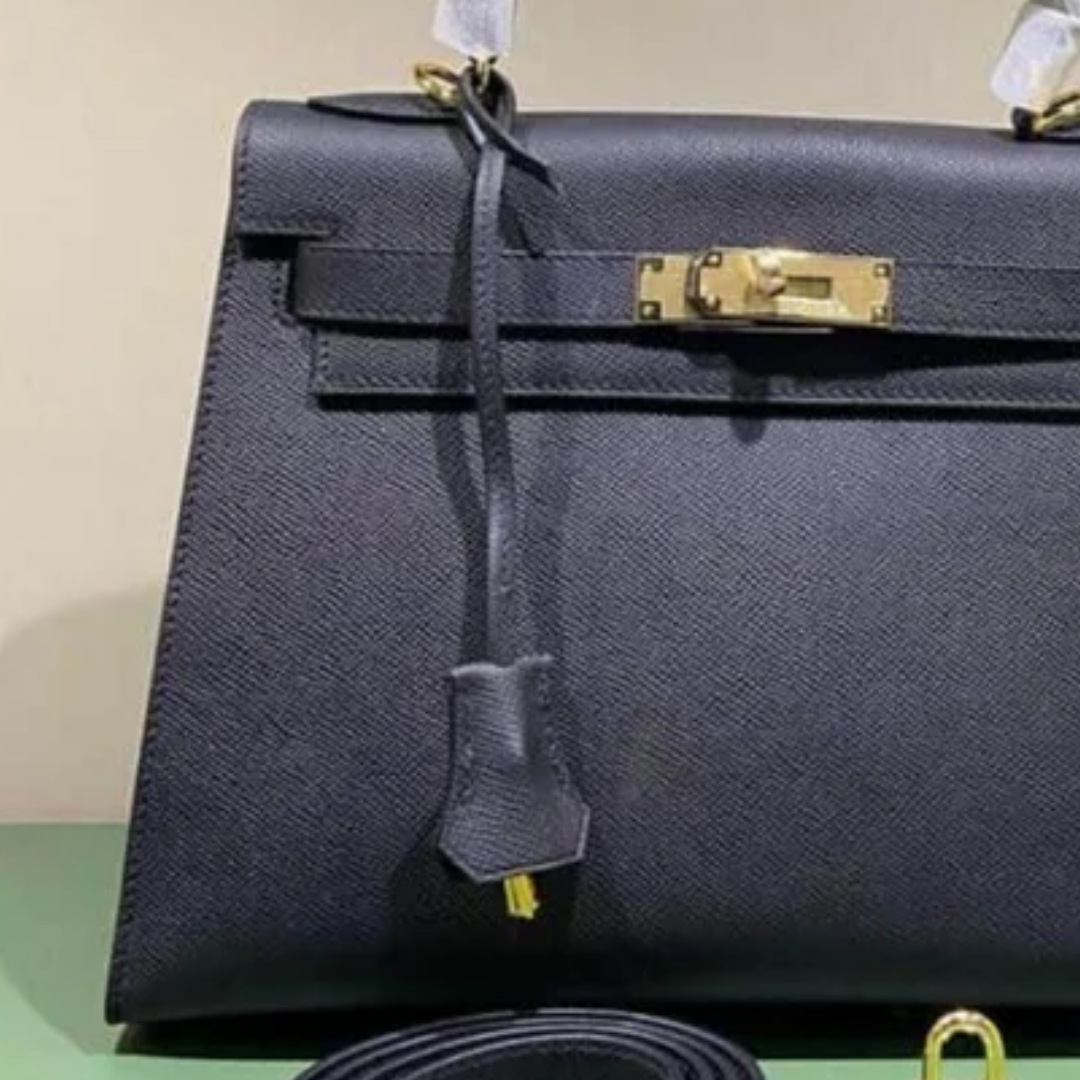 Tasche 25 Kly mit Goldbeschlägen in Schwarz