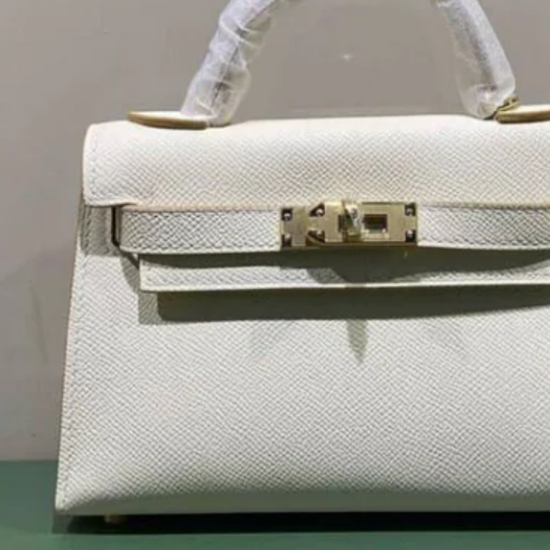 Tasche 20 Kly mit Goldbeschlägen in Cremeweiß