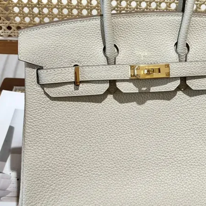 Tasche 25 Brk HSS Cr / GryTr aus Tg-Leder mit gebürsteten Goldbeschlägen