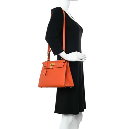 Tasche 25 Kly mit Goldbeschlägen in Orange