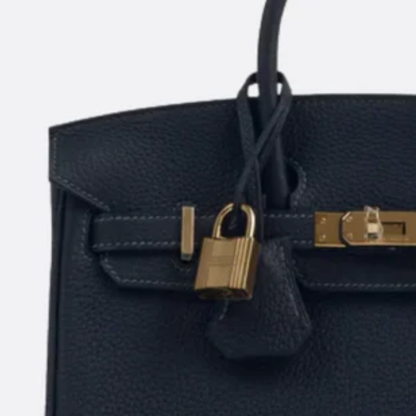 Tasche 25 Brk HSS Cr / GryTr aus Tg-Leder mit gebürsteten Goldbeschlägen